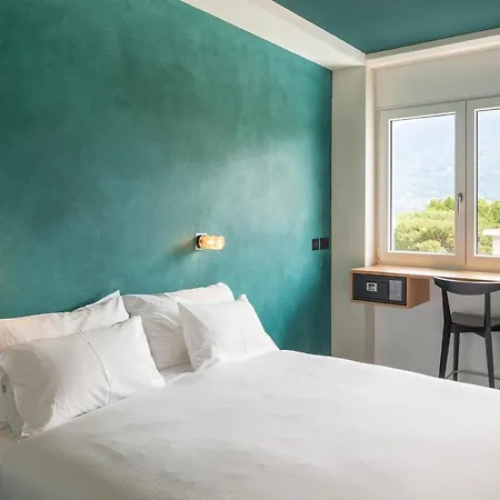 Riva & - Check-in 24hr Hotel